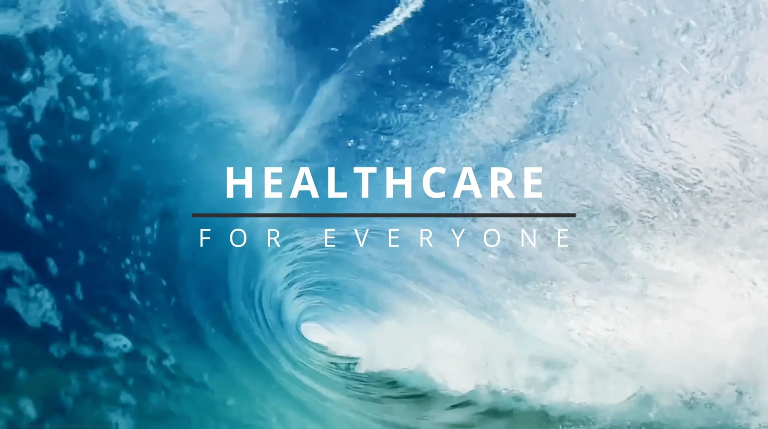 Wave crashing with the words Healthcare for Everyone overlayed on top